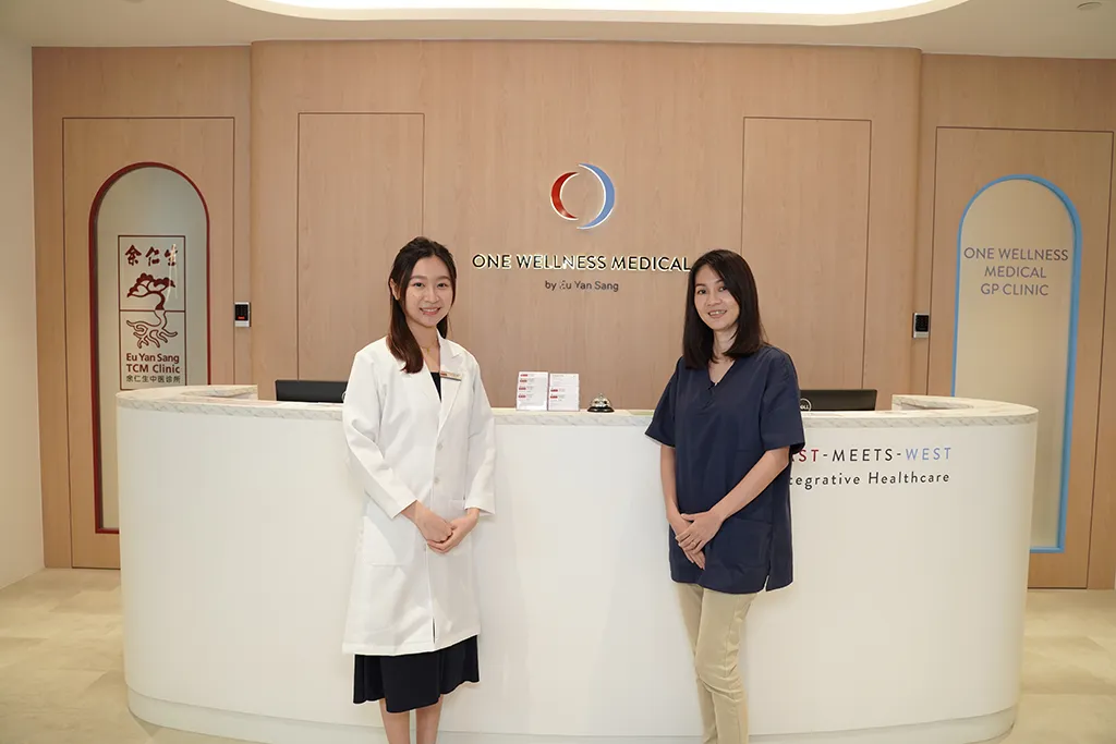 One Wellness Medical staff at the clinic's reception desk by Eu Yan Sang